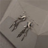 Tourtiwi - Willow Leaf Swallow Tassel Long Earrings
