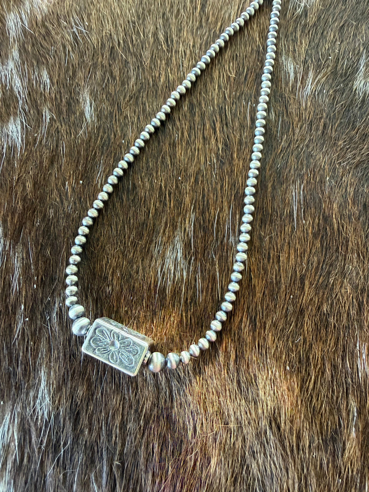 Z Bars Jewelry - Sterling Flower stamped barrel bead necklace 