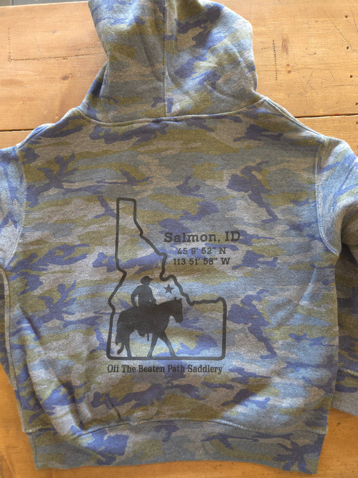 Off The Beaten Path Saddlery - Salmon, Idaho Camo Kids Hoodie